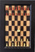 Black Cherry Chess Board With 2.5" Red Chess Pieces and Flat Black Frame